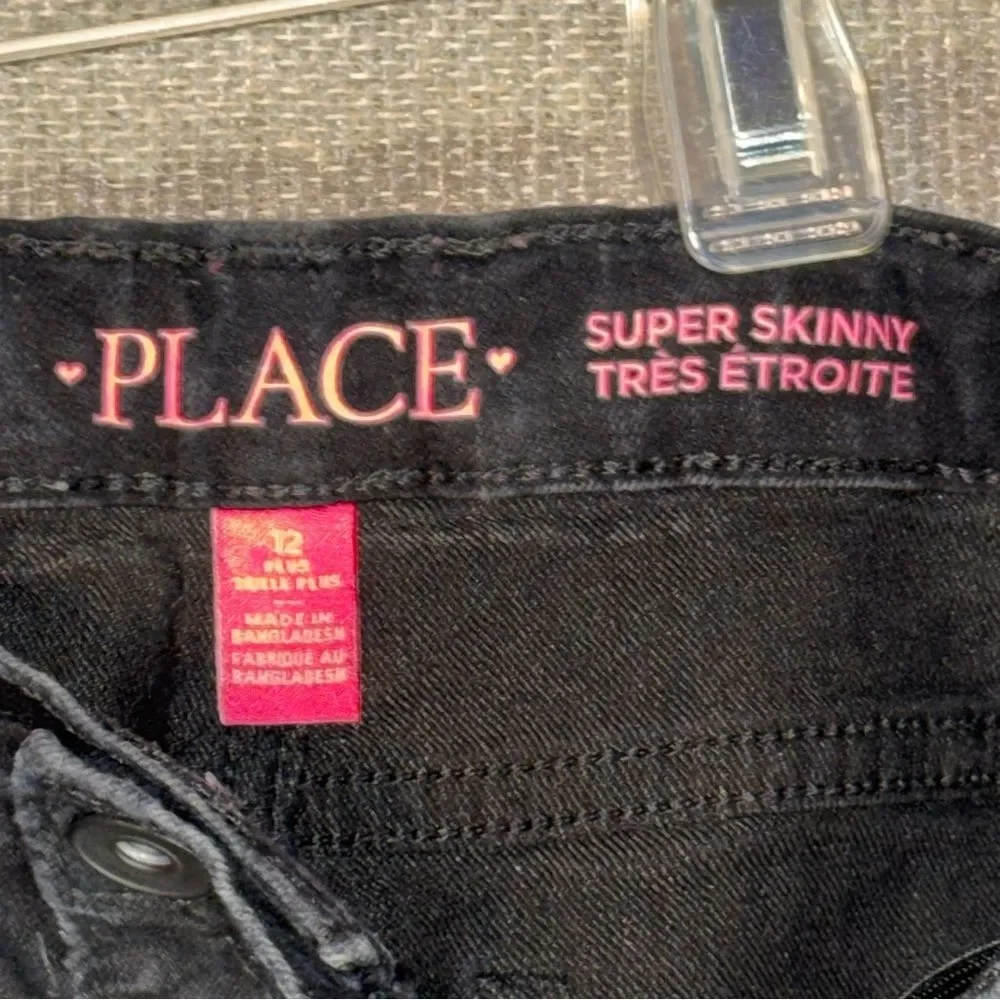 The children’s PLACE size 12 plus super skinny Black distressed Skinny Jeans